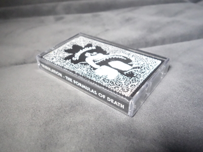 small-theformulasofdeath-cassette1.jpg